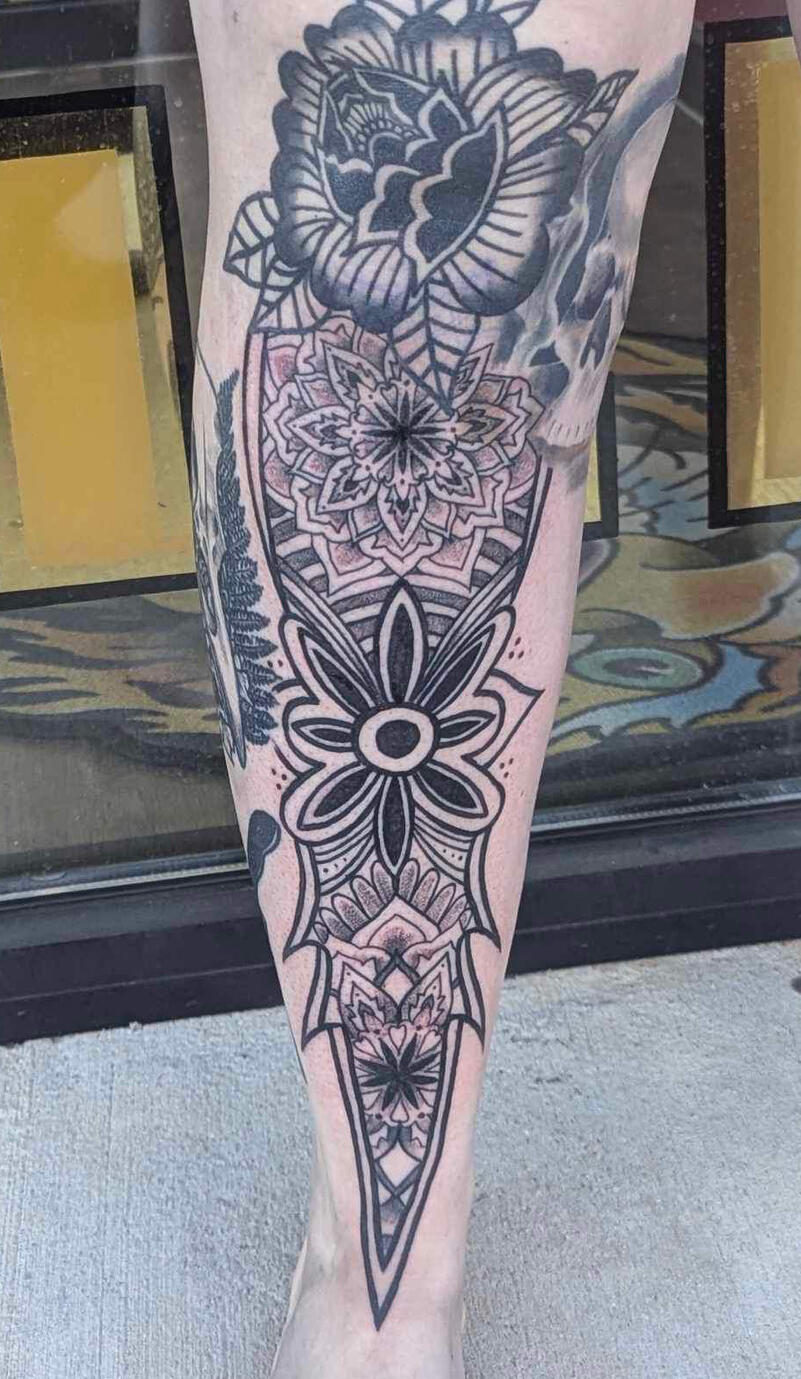 Ornamental Shin tattoo